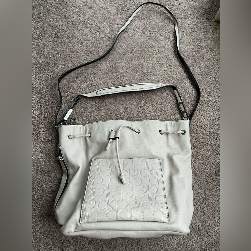 Gently used Calvin Klein cream colored bucket bag